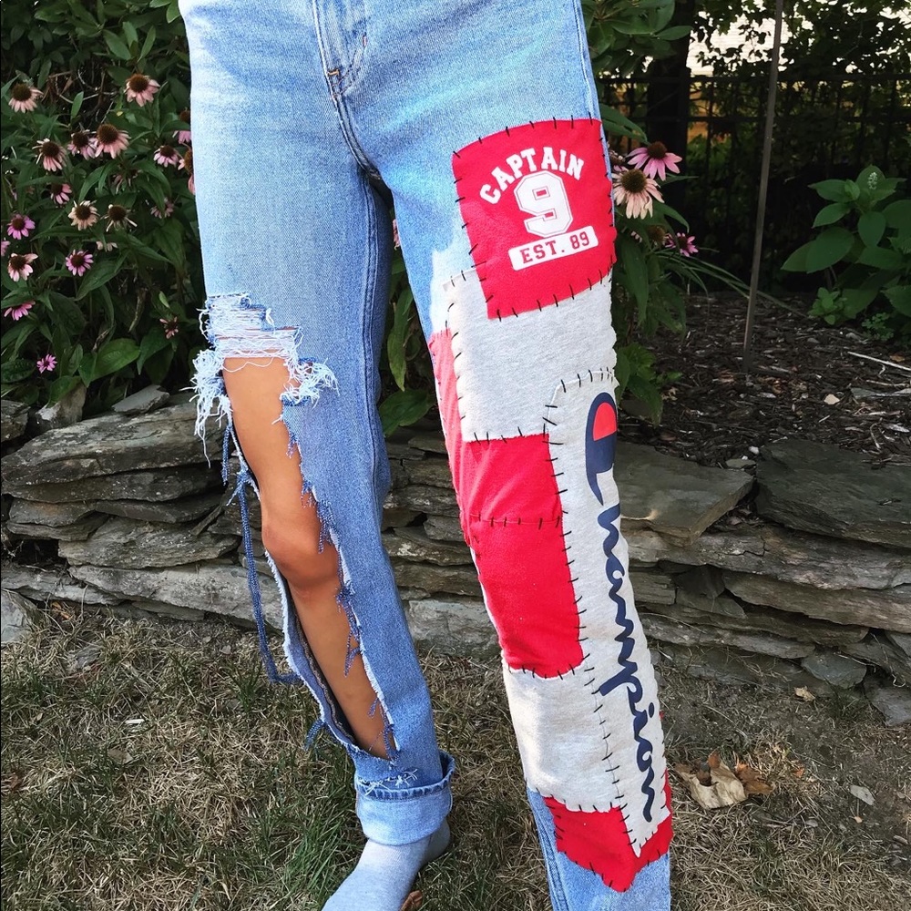 hand sewn patched Calvin Klein X Champion jeans